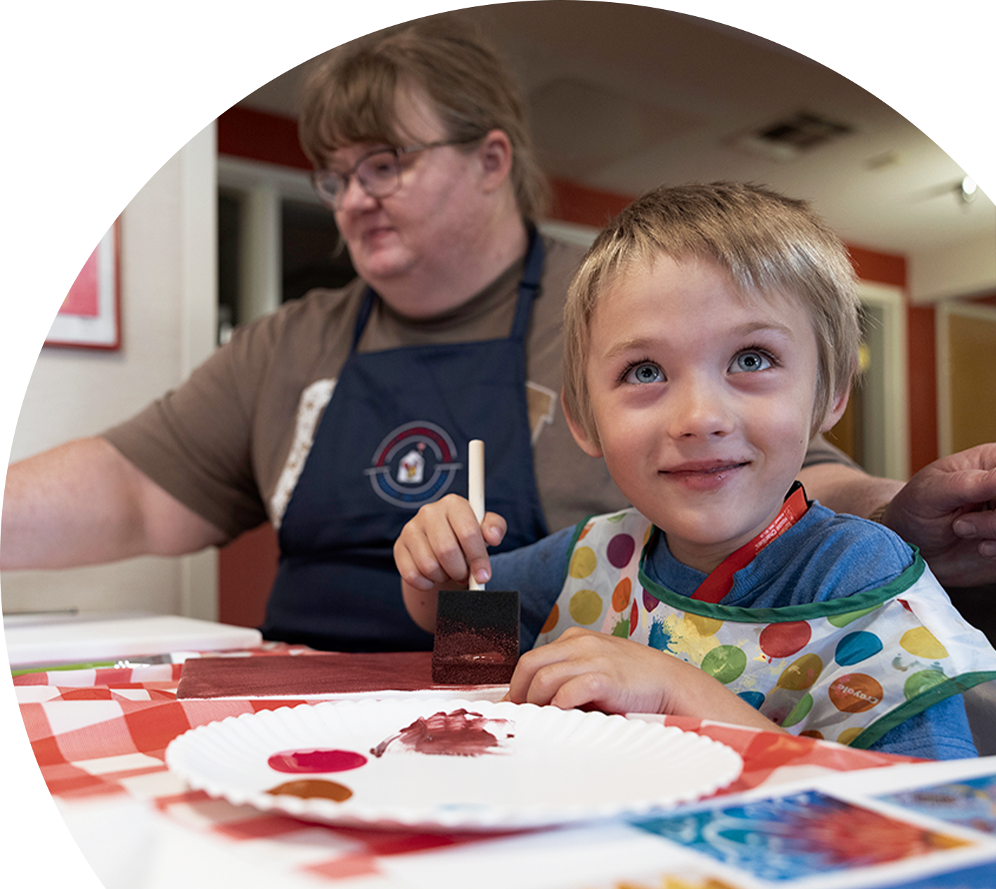 adult and child painting 